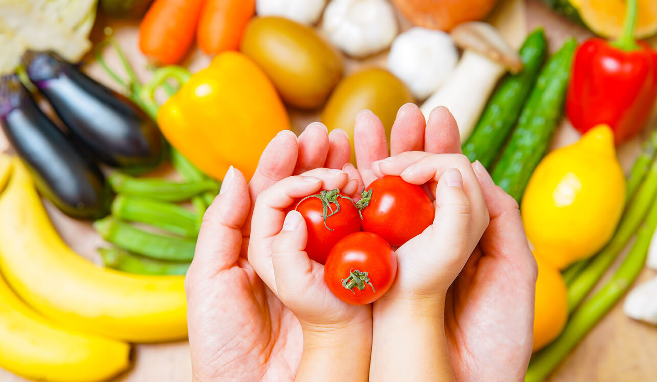 holding vegetables in hands